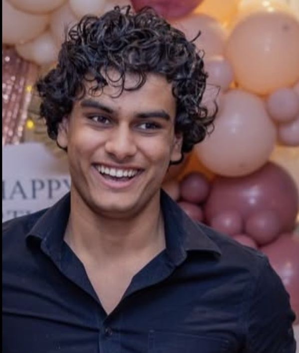 Waleed Shammarez smiling at a celebration